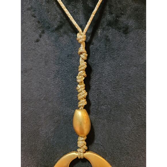 Women's Gold Circle Pendant Necklace with Braided Cord and Unique Bead Design - Picture 4 of 5